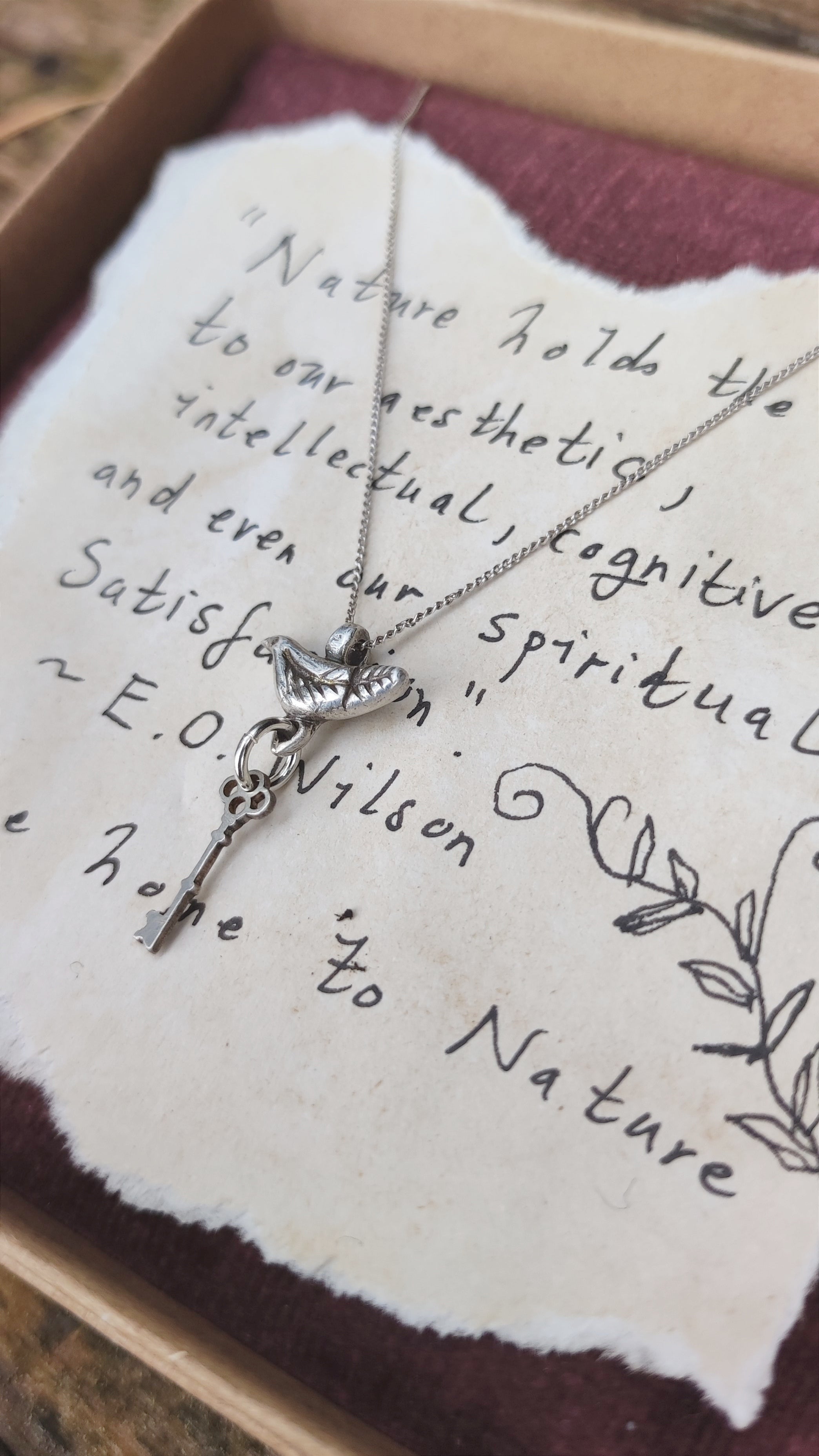 'Nature holds the Key' Silver pendant