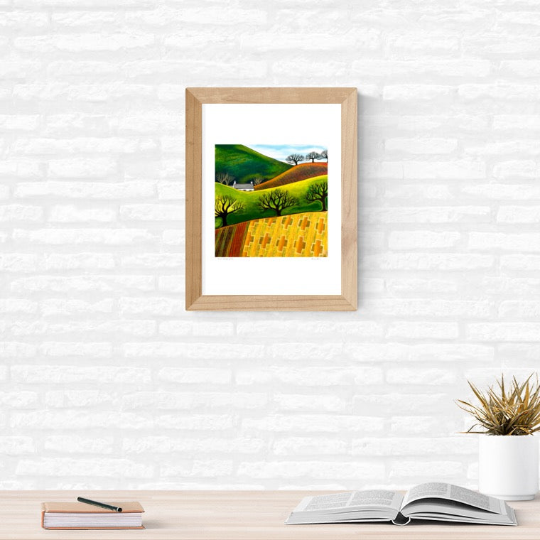 Across Blanket Fields print framed on wall in living space 