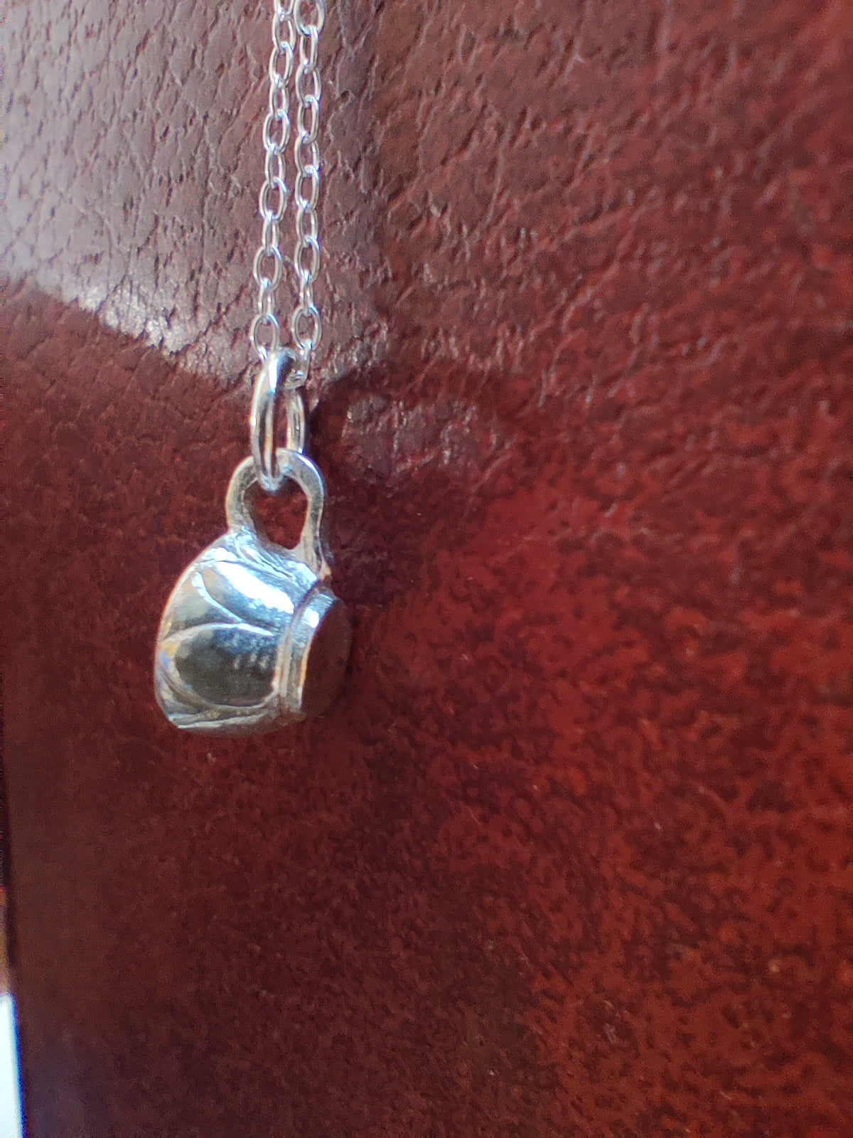 Handmade Irish silver tiny teacup necklace inspired by mindful tea drinking
