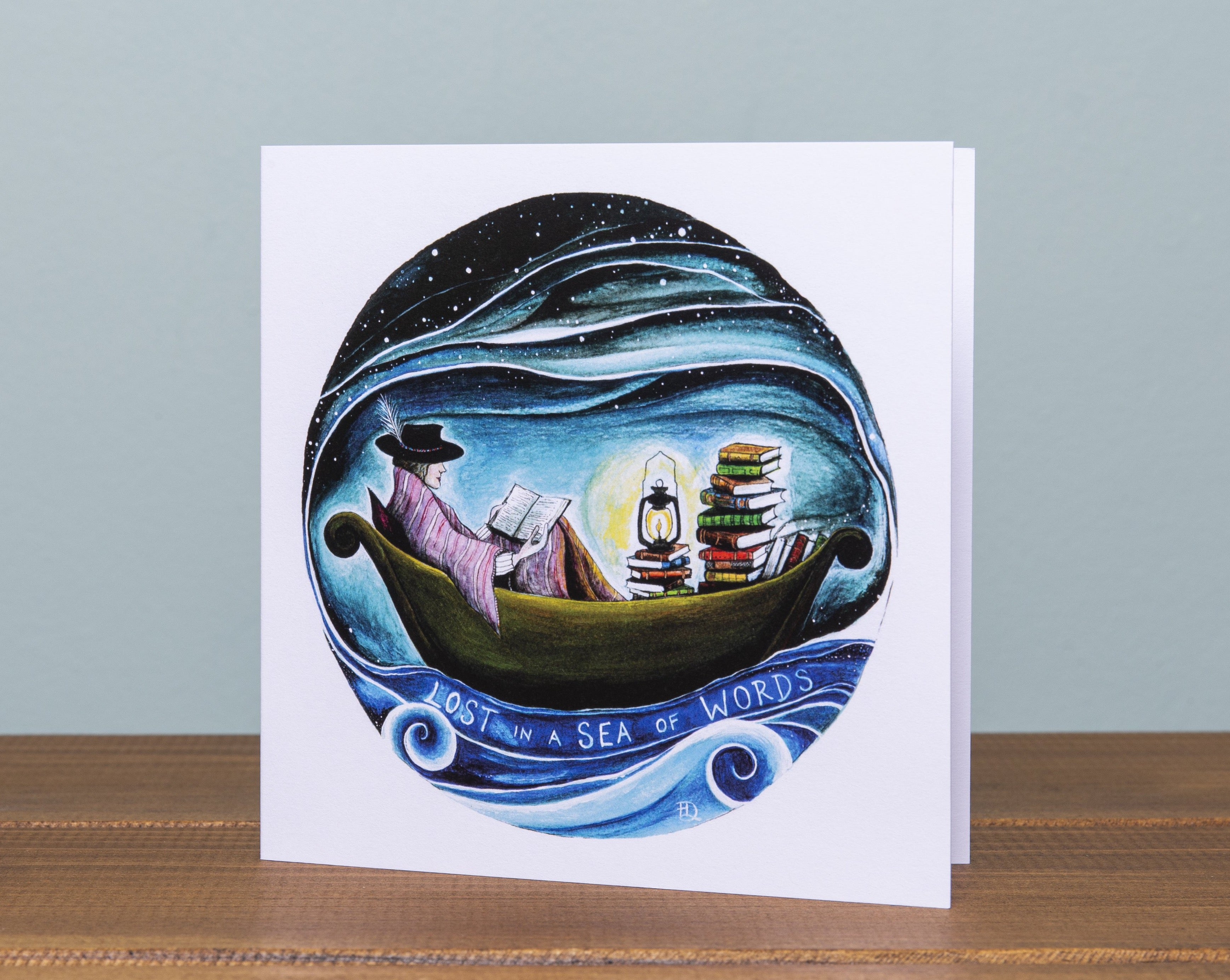 Lost in a Sea of Words art print by Northern Ireland Artist Hannah Dorman. Greeting card for book lovers, sanctuary, quiet time