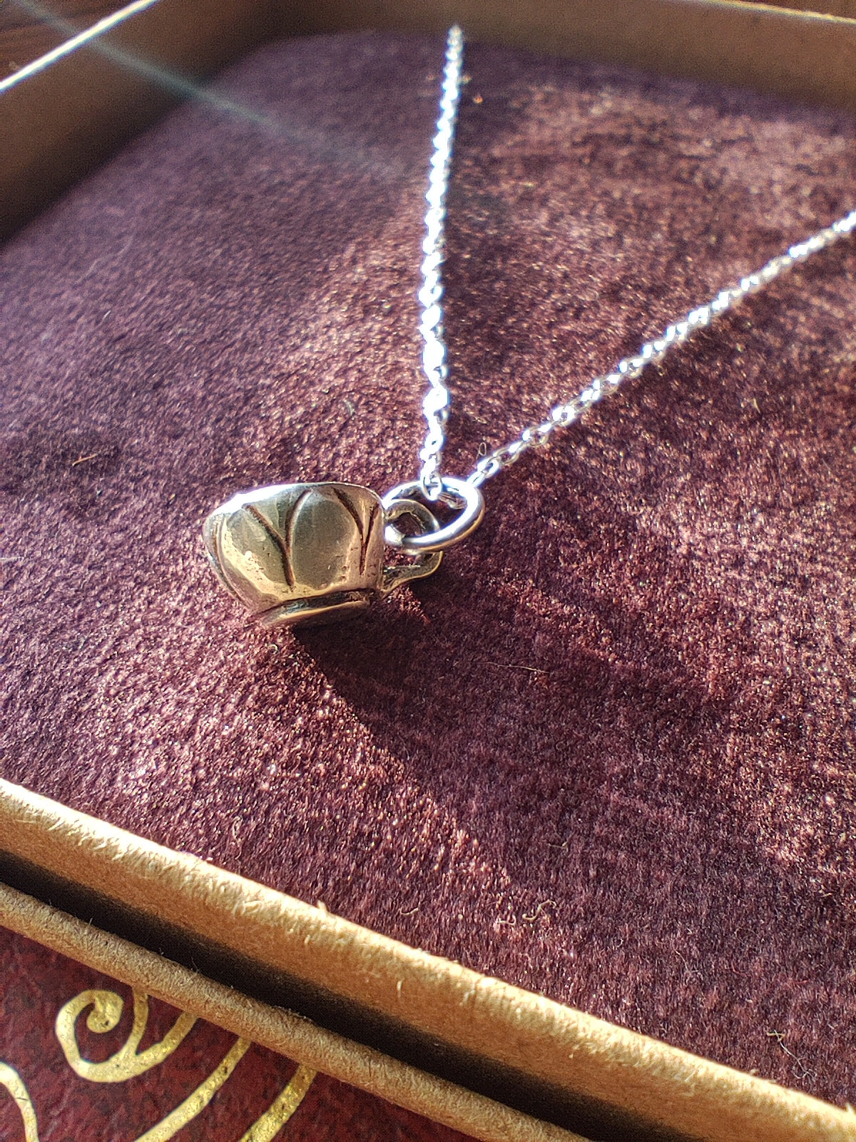 Handmade Irish silver tiny teacup necklace inspired by mindful tea drinking